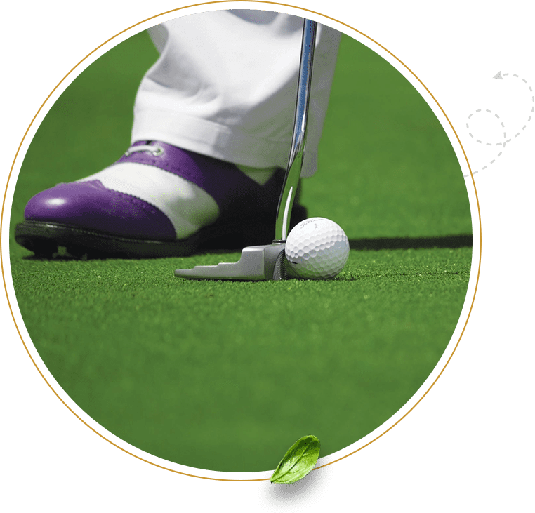 A close up of a person playing indoor golf.